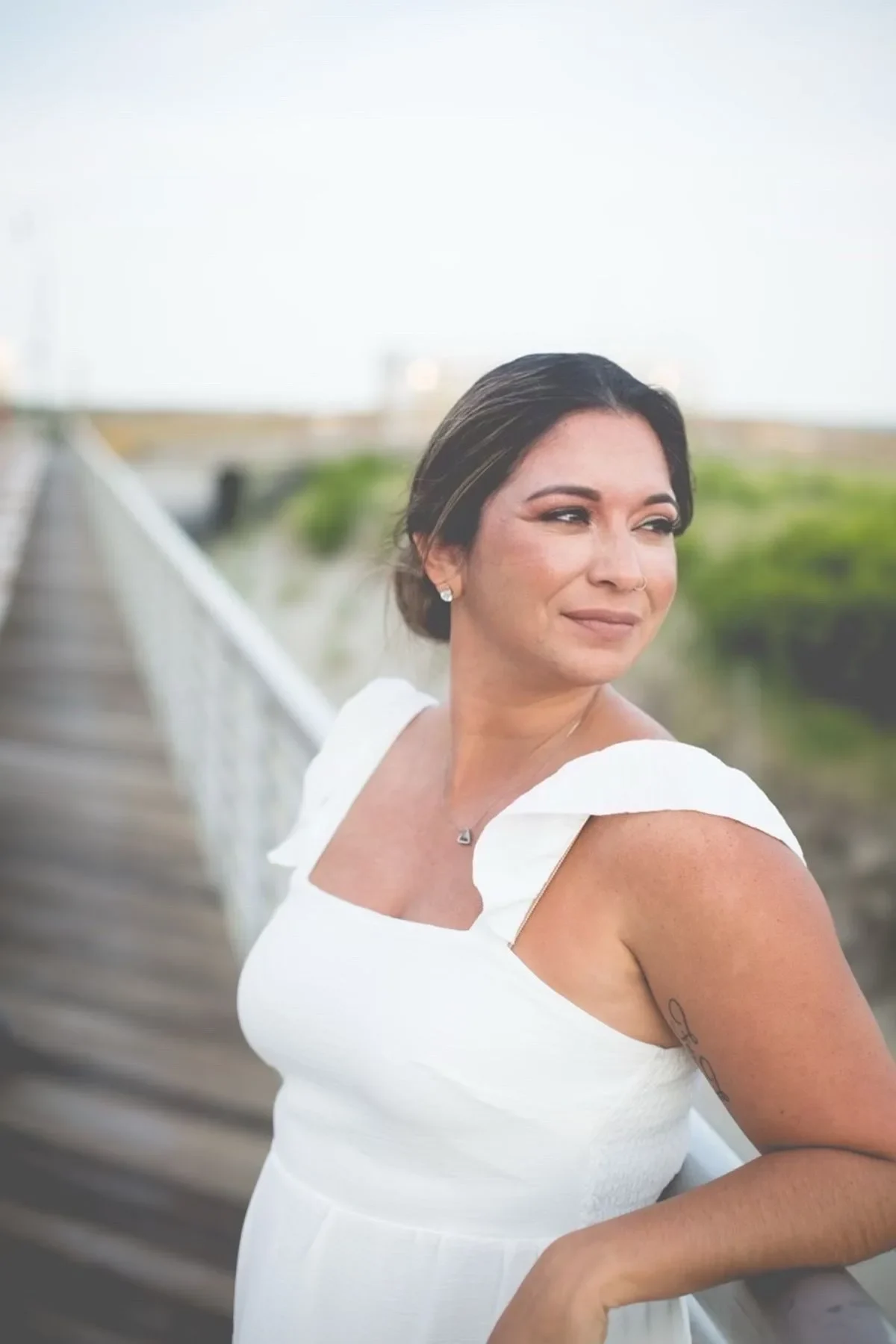 Romantic low bun with flawless bridal glam